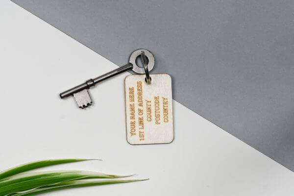 Custom Address and mobile number keyring (side 1)