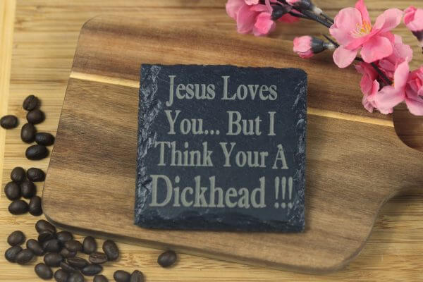 Jesus loves you but I think your a d**khead Slate Coaster