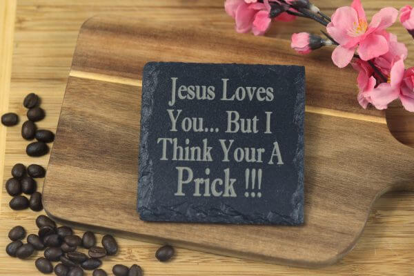 Jesus loves you but I think your a pr**k Slate Coaster